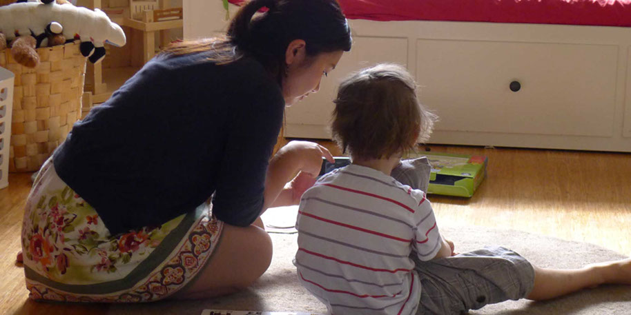 Autistic Boy & Applied Behaviour Analysis Therapist